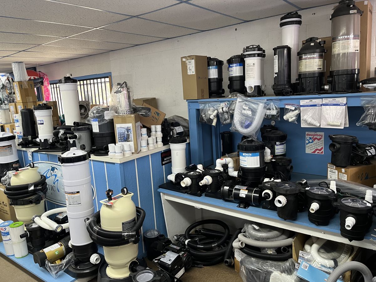 Pumps, filters, and equipment stocked inside the Fontana store