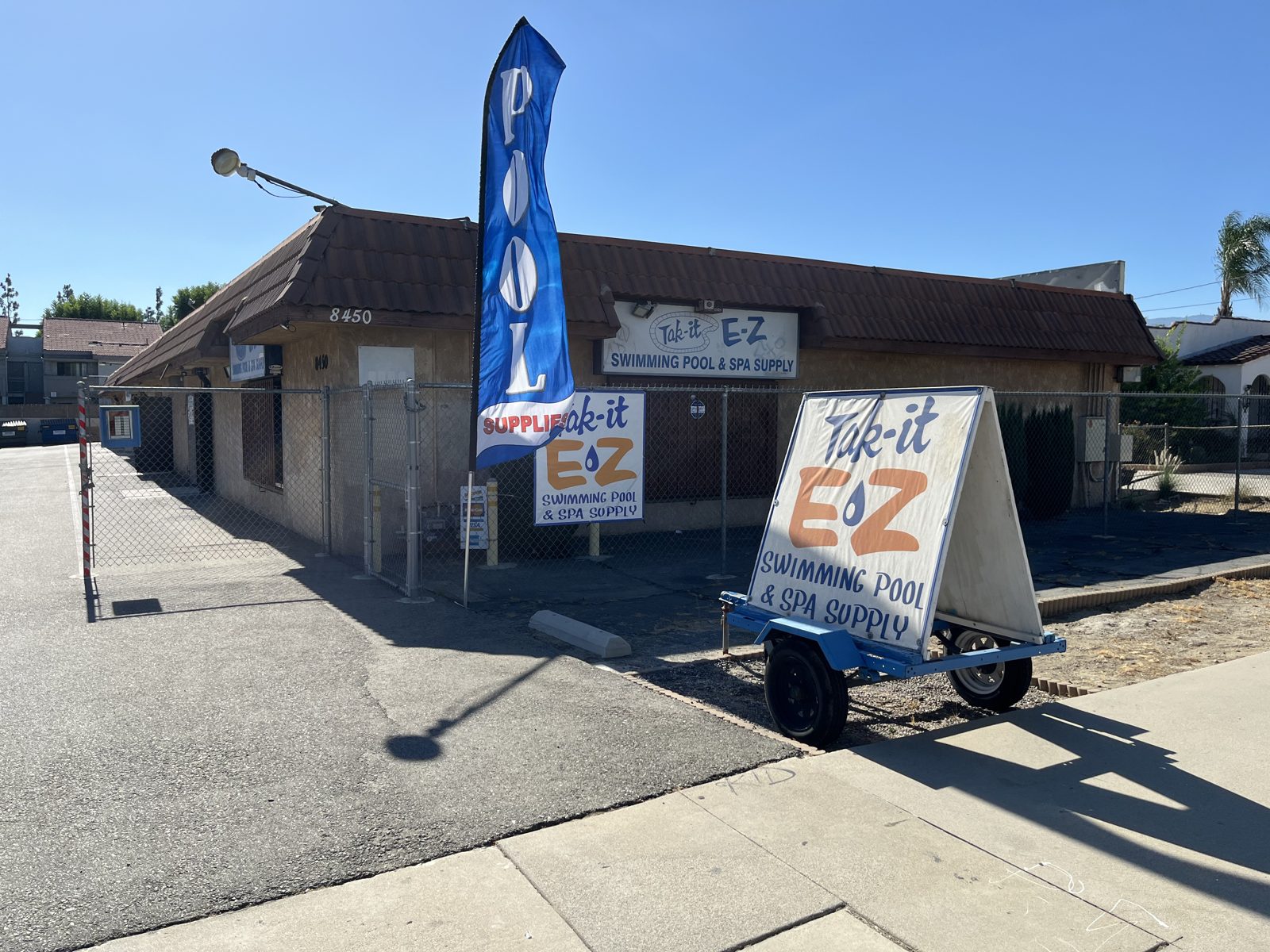 Tak-It-EZ Swimming Pool & Spa storefront on Tamarind Avenue in Fontana